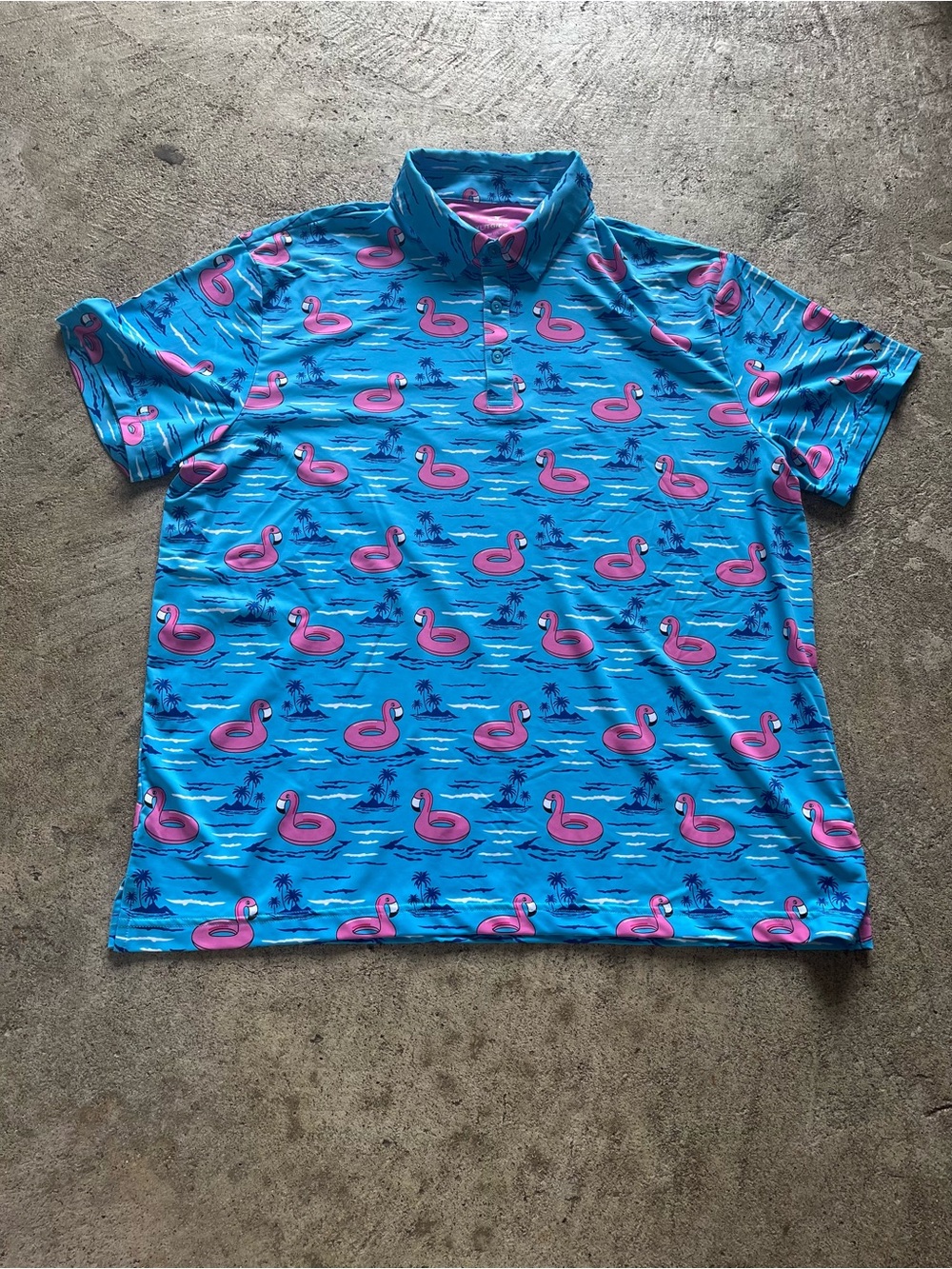 Birdie Bound Tropical Blue Polo with Pink Flamingo Float Print